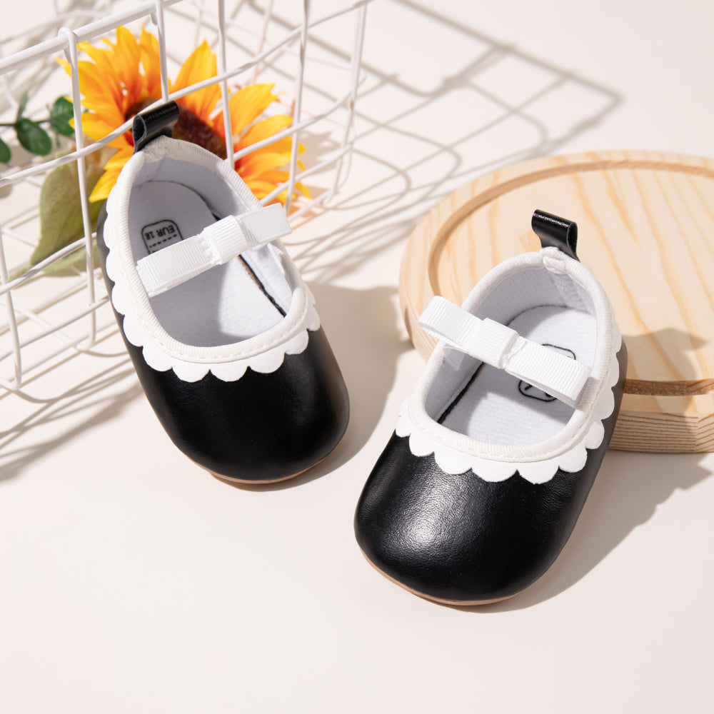 Sapatos de bebé com laço