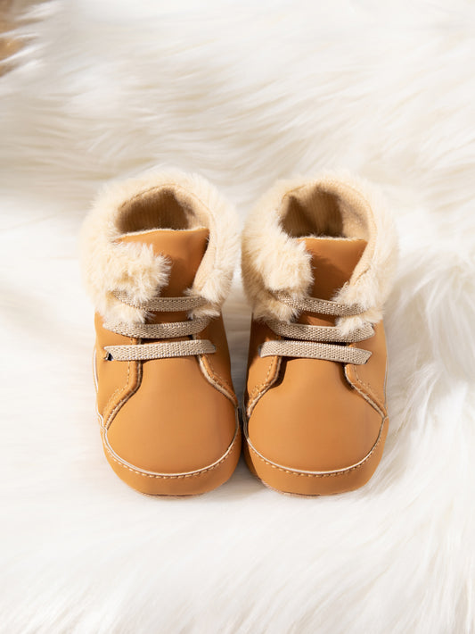 Pantufas de bebé em pele sintética com detalhe de laço