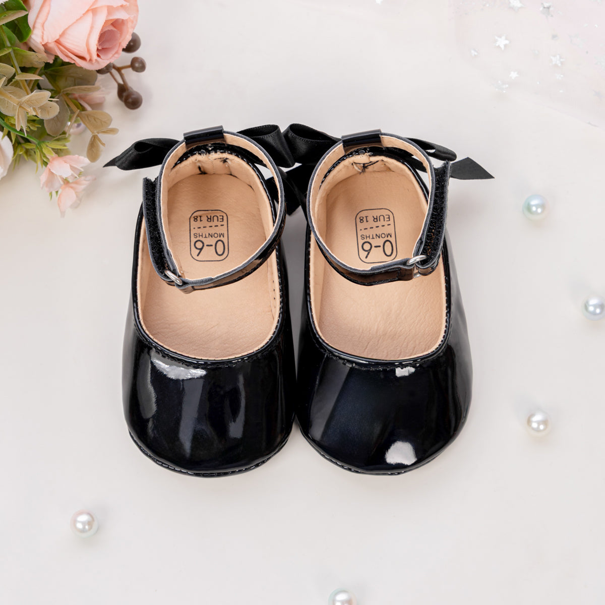 Sapatos de bebé com detalhe de laço elegante