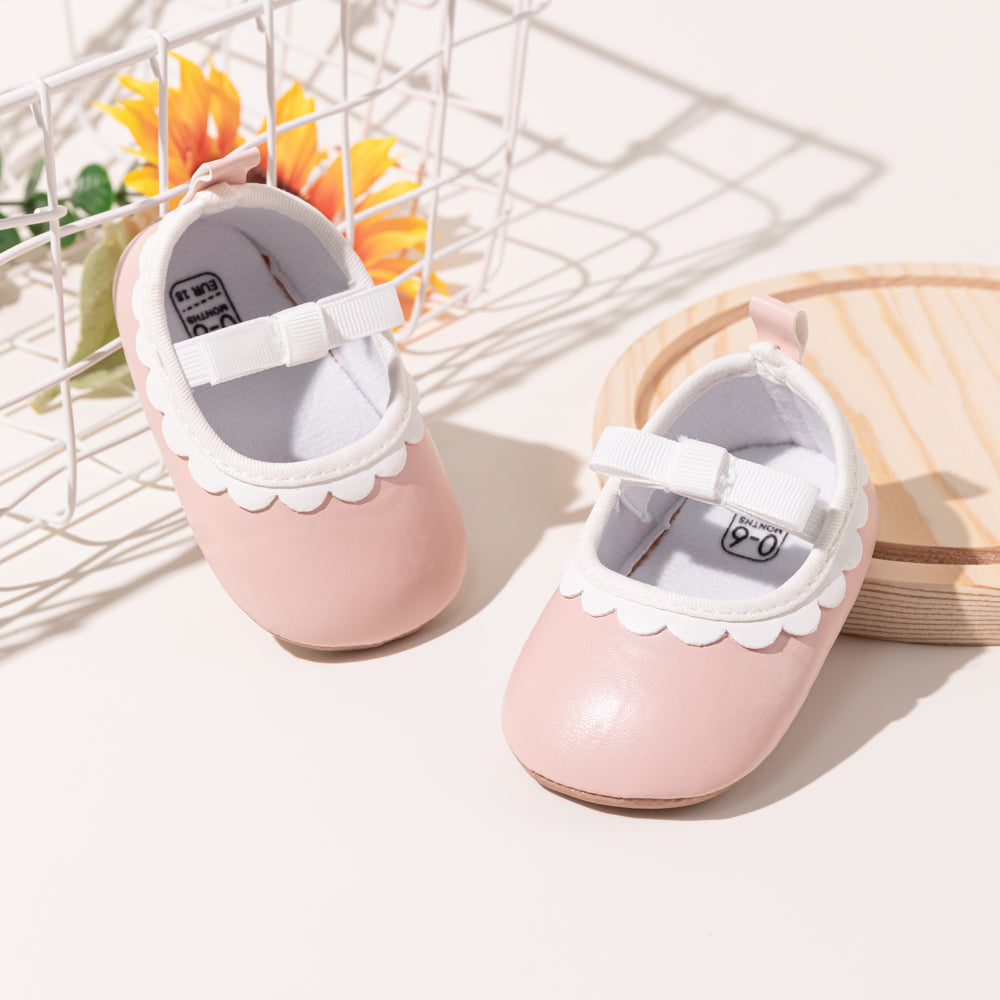 Sapatos de bebé com laço