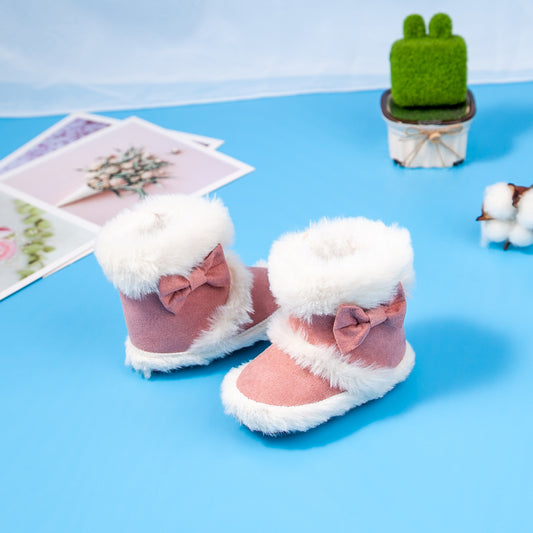 Pantufas de bebé com detalhe de laço e pele sintética