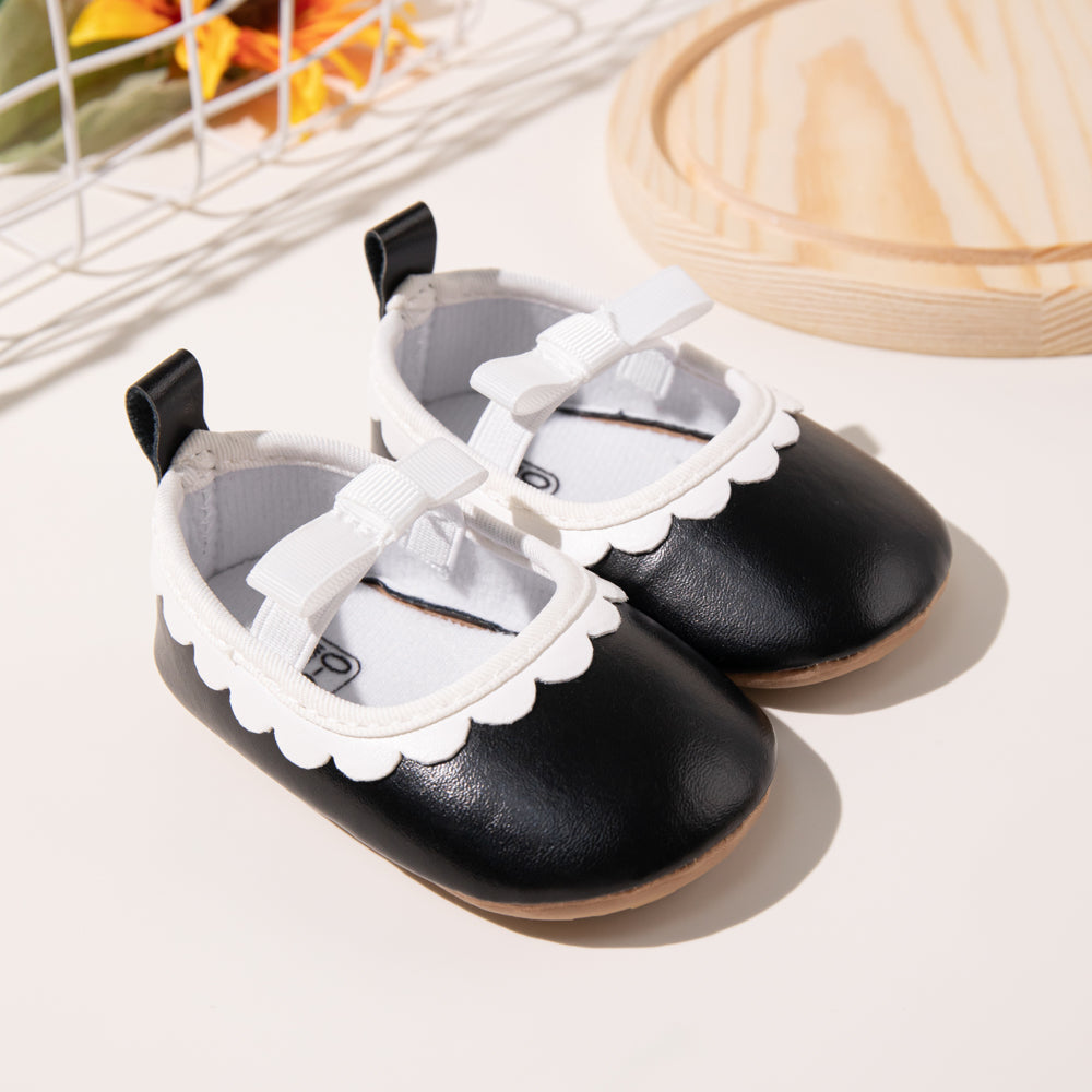 Sapatos de bebé com laço